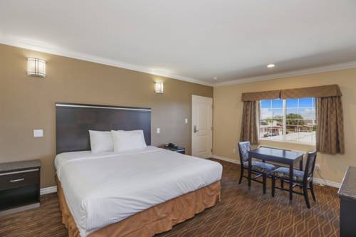 Imagen de la habitación del Hotel 3rd Avenue Inn. Foto 16