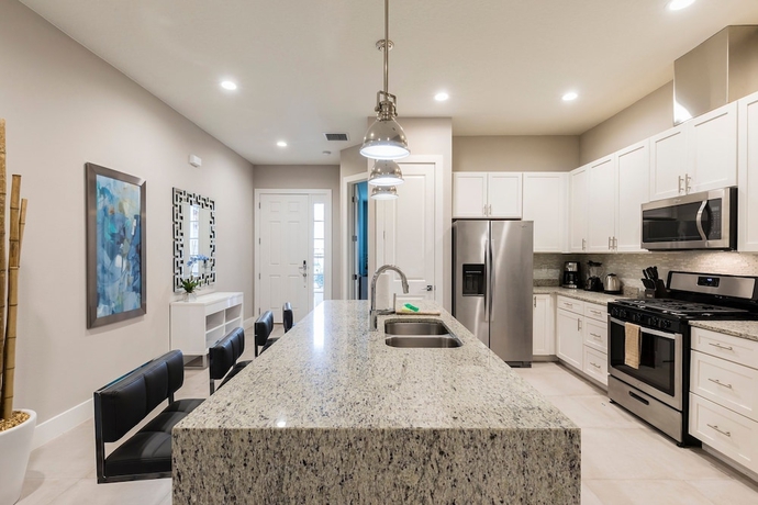 Imagen de la habitación del Hotel 4 BR 4 BA Hidden Gem Min Disney 1804ft. Foto 4
