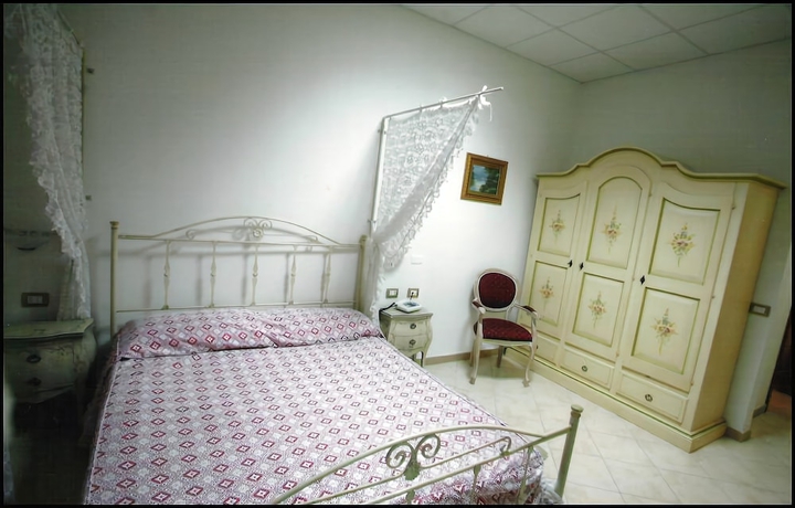 Imagen de la habitación del Hotel 4 Mori. Foto 9