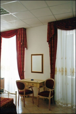 Imagen de la habitación del Hotel 4 Mori. Foto 11