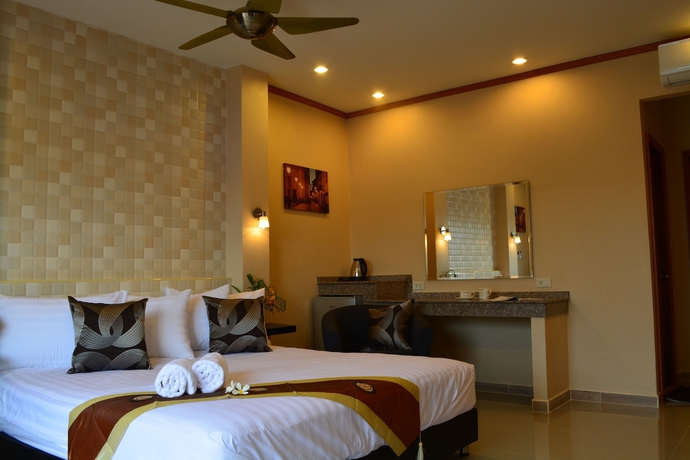 Imagen de la habitación del Hotel 4 Palms Resort. Foto 5