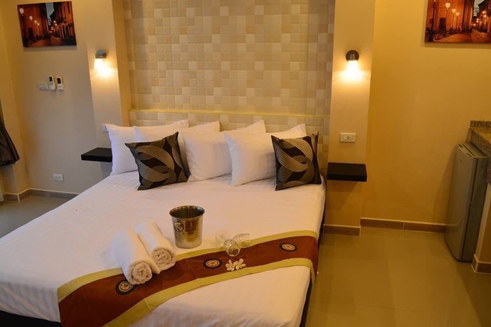 Imagen de la habitación del Hotel 4 Palms Resort. Foto 8
