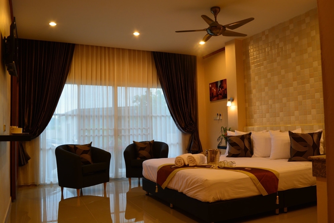 Imagen de la habitación del Hotel 4 Palms Resort. Foto 9