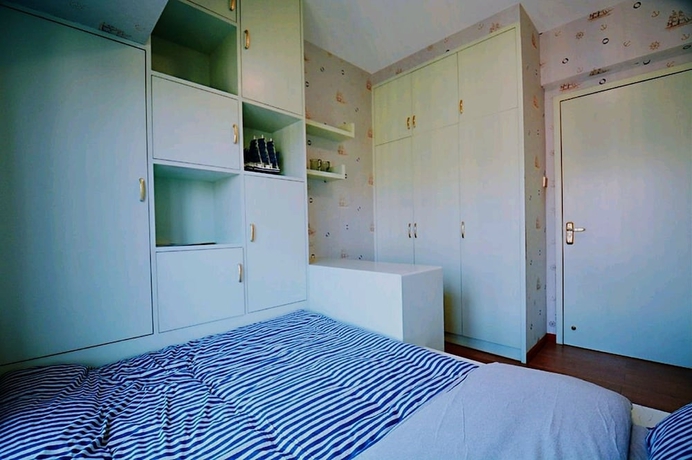 Imagen de la habitación del Hotel 4 Seasons Big Family 3 Queen Beds and High Rise View. Foto 3