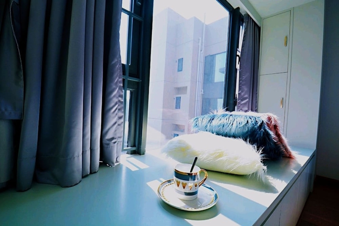 Imagen de la habitación del Hotel 4 Seasons Big Family 3 Queen Beds and High Rise View. Foto 7