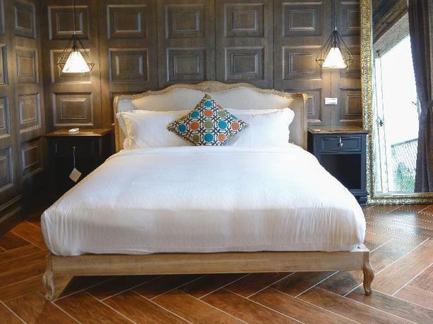 Imagen de la habitación del Hotel 4 Sisters Villa. Foto 10