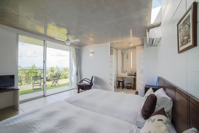 Imagen de la habitación del Hotel 413 Hamahiga andcafe. Foto 12