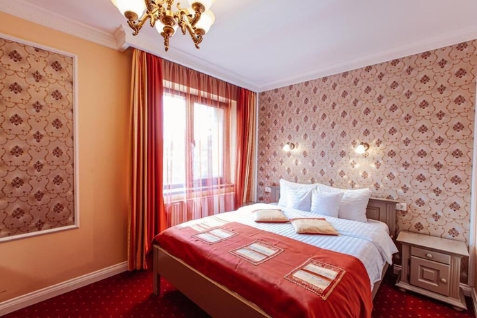 Imagen de la habitación del Hotel 4Cardinals Boutique. Foto 4