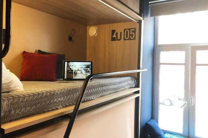 Imagen de la habitación del Hotel 4U Capsule. Foto 16