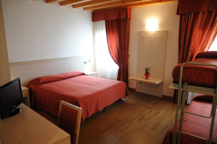 Imagen de la habitación del Hotel 5 Colonne. Foto 11