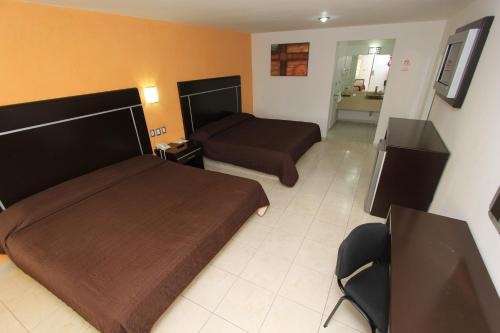 Imagen de la habitación del Hotel 5 Inn. Foto 6