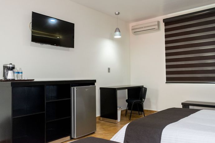 Imagen de la habitación del Hotel 5 Inn Plus. Foto 5