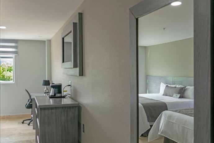 Imagen de la habitación del Hotel 5 Inn Plus. Foto 13