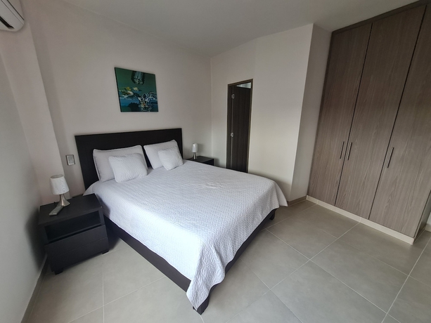 Imagen de la habitación del Hotel 506 Moderno Aparta-Suite en Versalles Tipo Loft - Cali Tower Suites and Lofts. Foto 11
