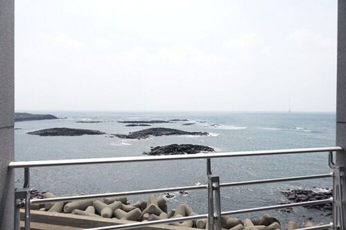 Imagen de la habitación del Hotel 52, Jeju. Foto 17