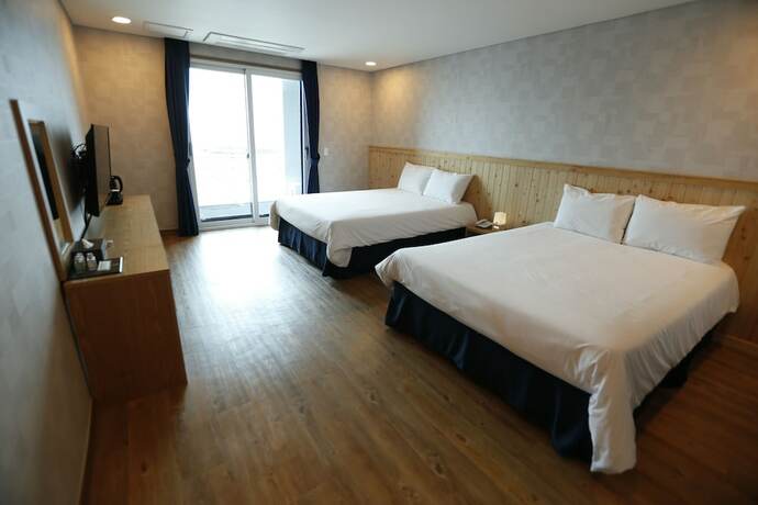 Imagen de la habitación del Hotel 52, Jeju. Foto 24