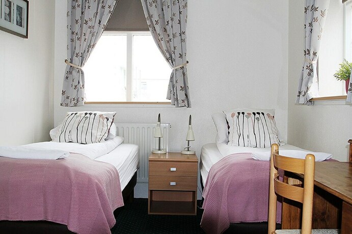 Imagen de la habitación del Hotel 550 Guesthouse. Foto 27