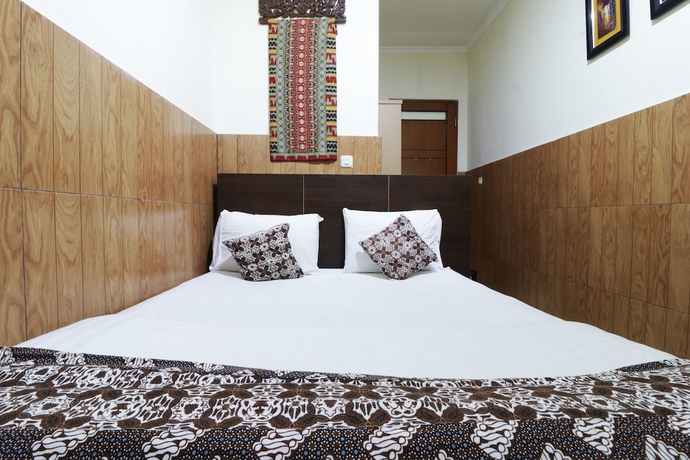 Imagen de la habitación del Hotel 58 Guesthouse Tangerang. Foto 2