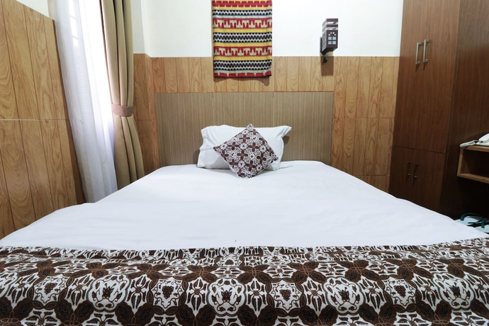 Imagen de la habitación del Hotel 58 Guesthouse Tangerang. Foto 4