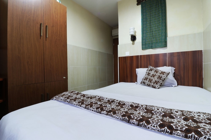 Imagen de la habitación del Hotel 58 Guesthouse Tangerang. Foto 5
