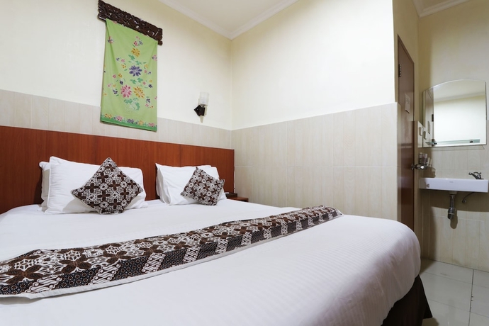 Imagen de la habitación del Hotel 58 Guesthouse Tangerang. Foto 9