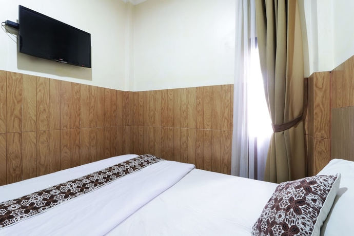 Imagen de la habitación del Hotel 58 Guesthouse Tangerang. Foto 11