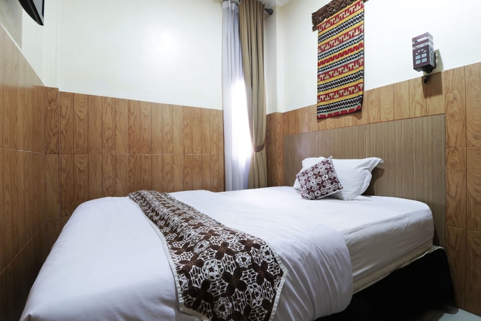 Imagen de la habitación del Hotel 58 Guesthouse Tangerang. Foto 12