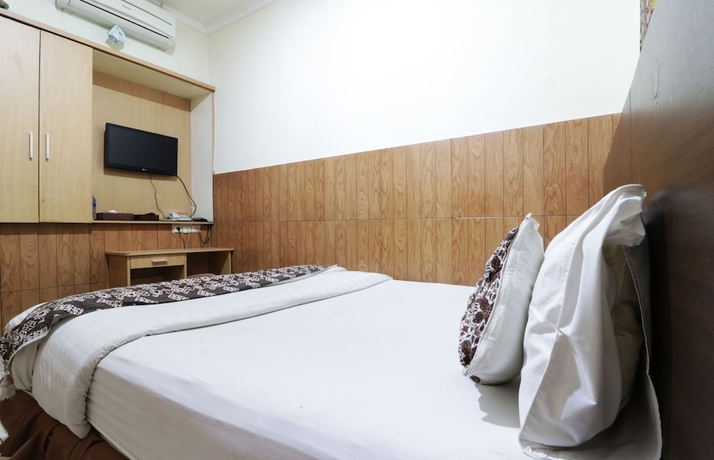 Imagen de la habitación del Hotel 58 Guesthouse Tangerang. Foto 13