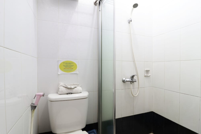 Imagen de la habitación del Hotel 58 Guesthouse Tangerang. Foto 14