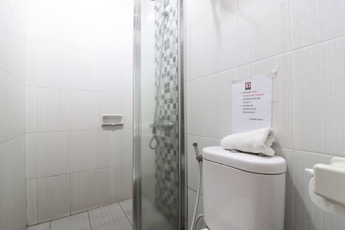 Imagen de la habitación del Hotel 58 Guesthouse Tangerang. Foto 15