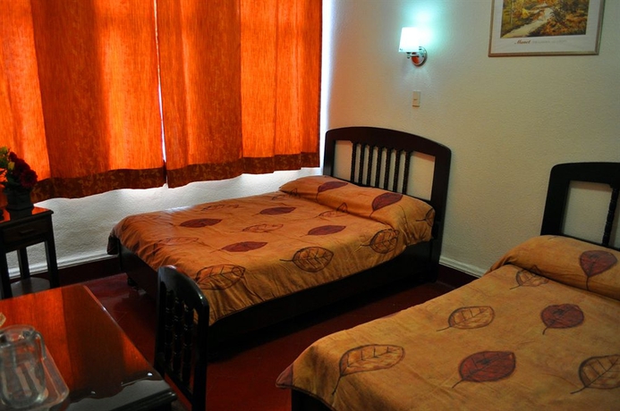 Imagen de la habitación del Hotel 5a Avenida. Foto 4