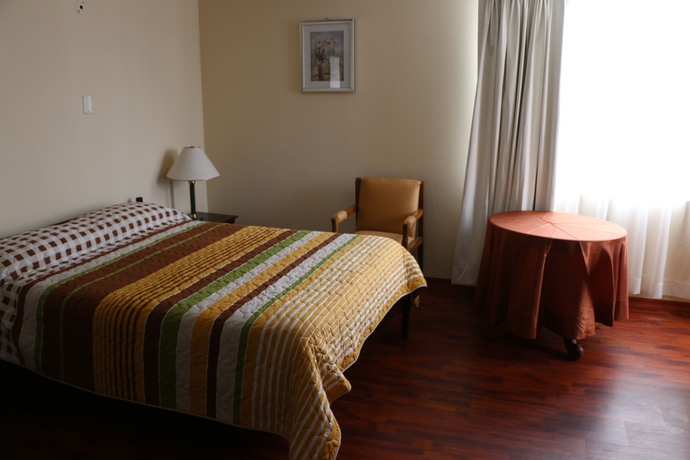 Imagen de la habitación del Hotel 6 De Diciembre. Foto 7