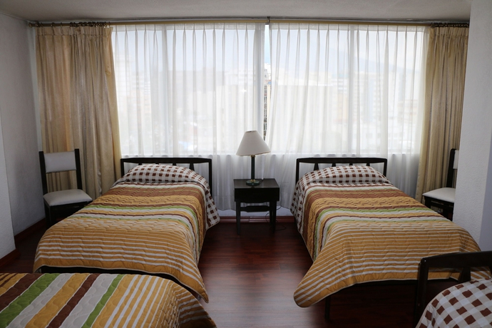 Imagen de la habitación del Hotel 6 De Diciembre. Foto 8