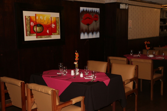 Imagen del bar/restaurante del Hotel 6 De Diciembre. Foto 6