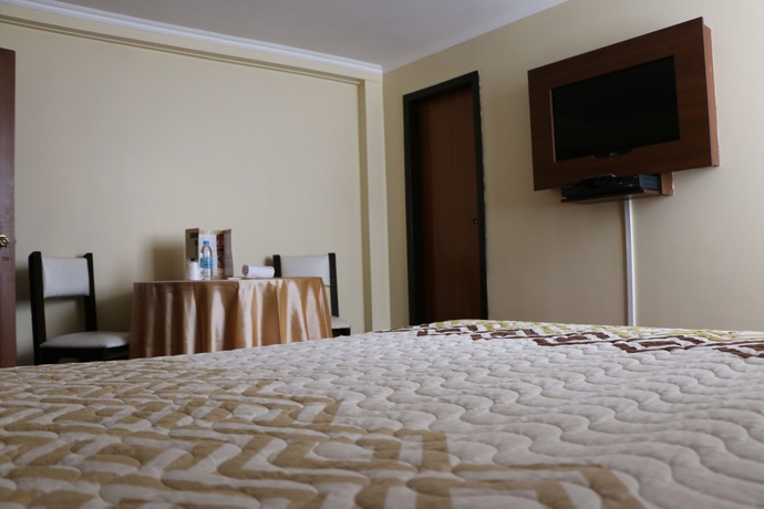 Imagen de la habitación del Hotel 6 De Diciembre. Foto 11