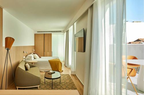 Imagen de la habitación del Hotel 60 Balconies Iconic. Foto 20