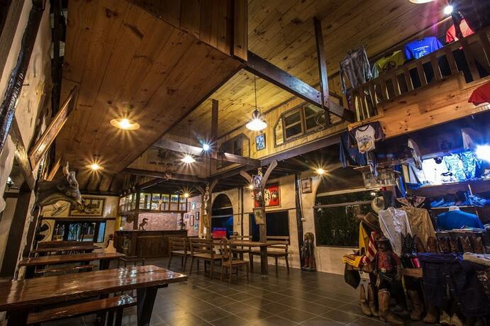 Imagen del bar/restaurante del Hotel 60s Town. Foto 18