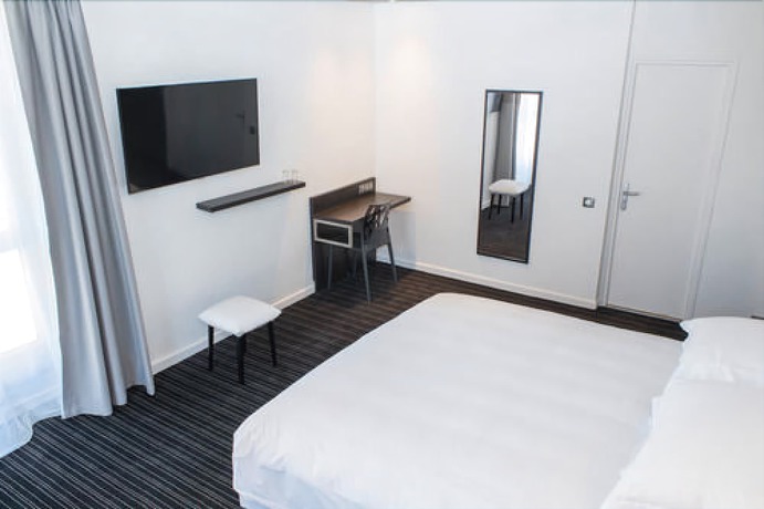 Imagen de la habitación del Hotel 66. Foto 7