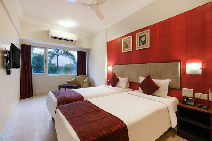 Imagen de la habitación del Hotel 7 Apple Pimpri Pune. Foto 21