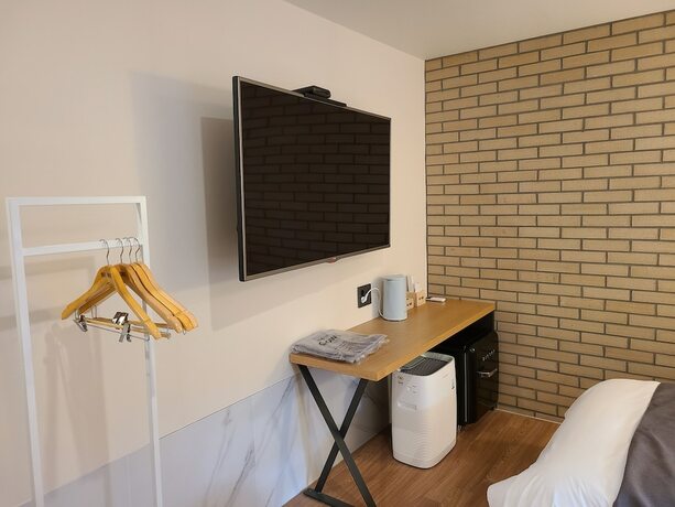 Imagen de la habitación del Hotel 7 Bricks Hotel. Foto 11