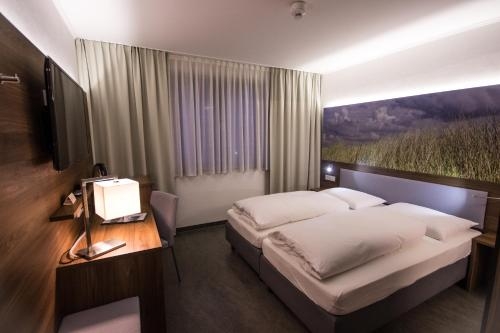 Imagen de la habitación del Hotel 7 Continents. Foto 10