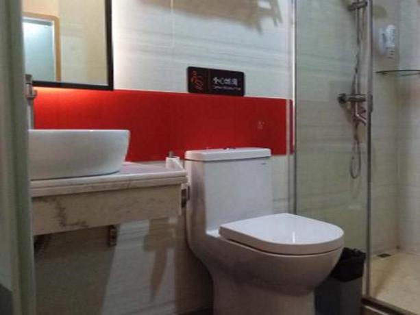 Imagen de la habitación del Hotel 7 DAYS PREMIUM HUIZHOU BOLUOHU TOWN LUOFU MOUNTAIN. Foto 3