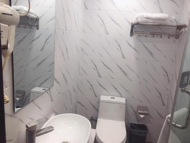 Imagen de la habitación del Hotel 7 DAYS PREMIUMA LANZHOU DEMOCRACY XI ROAD RAILWAY. Foto 6