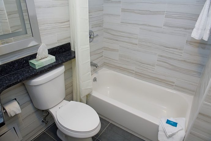 Imagen de la habitación del Hotel 7 Days Bronx. Foto 7