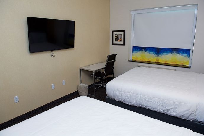 Imagen de la habitación del Hotel 7 Days Bronx. Foto 12