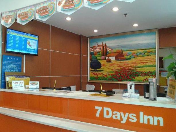 Imagen de los interiores del Hotel 7 Days Inn Bird's Nest Stadium. Foto 11