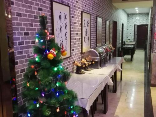 Imagen general del Hotel 7 Days Inn Lvliang Bus Terminal. Foto 8