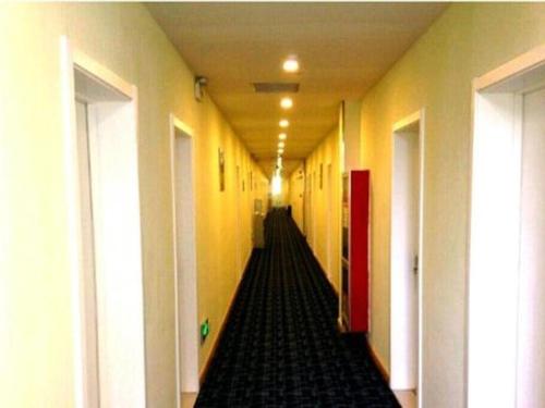 Imagen general del Hotel 7 Days Inn Zibo Linzi District Tianqi Road Qina Studio. Foto 2