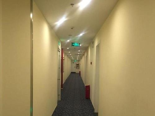 Imagen general del Hotel 7 Days Inn Zibo Linzi District Tianqi Road Qina Studio. Foto 6