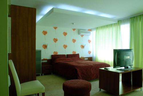 Imagen de la habitación del Hotel 7 Days Kamyanets-Podilskyi. Foto 6